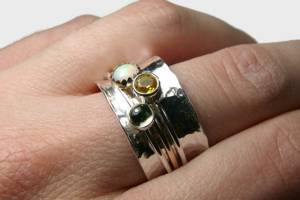 three stone spinning ring