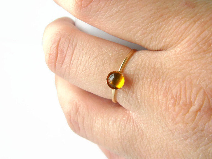 Gold ring online with amber stone