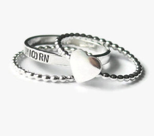 Sterling silver stacking name rings with heart