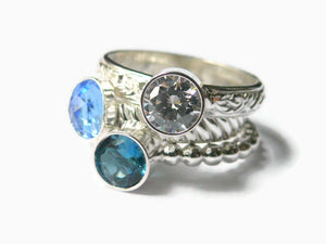 aqua and dark blue sterling silver stacking birthstone rings