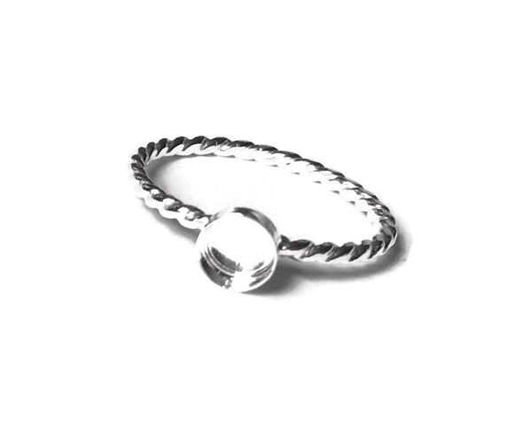 Twisted band ring blank