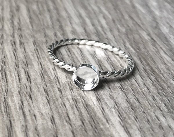 Ring blank twisted band