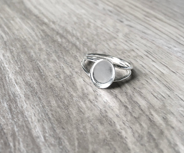 Double band oval ring setting