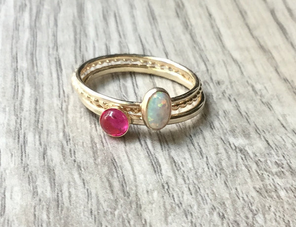 yellow gold stacking gemstone rings with ruby and opal