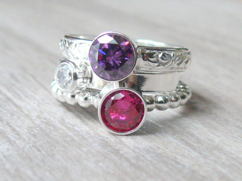 pink and purple birthstone stacking rings