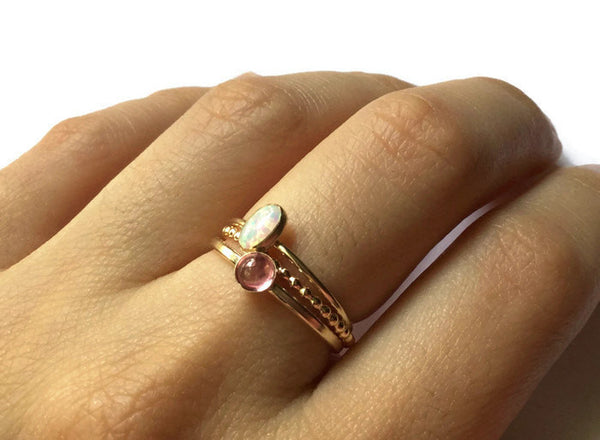 pink sapphire and opal yellow gold ring set