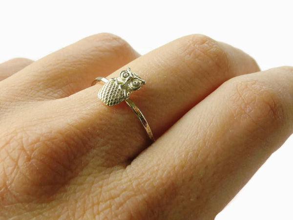 owl ring on hand