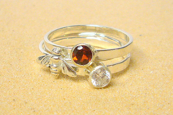 silver bee ring with garnet