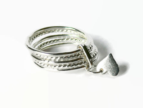 sterling silver semainier ring with attached heart charm