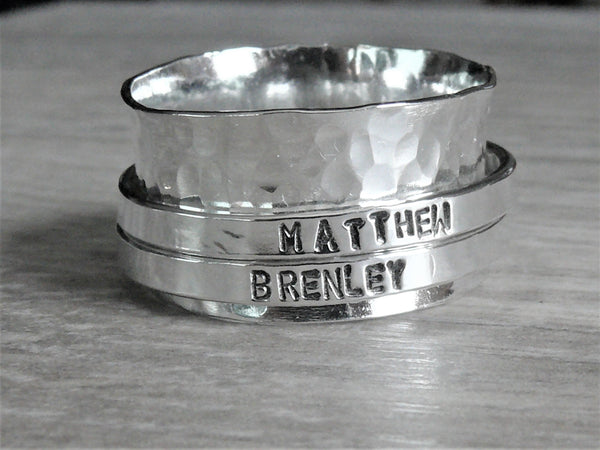 silver spinner ring with name