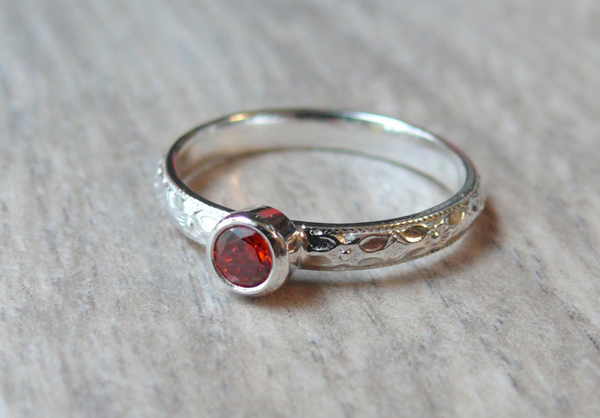 red gemstone stacking ring