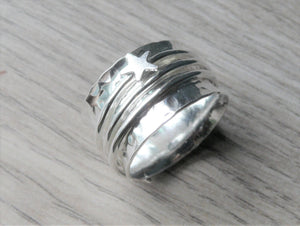 Sterling silver spinner ring with star